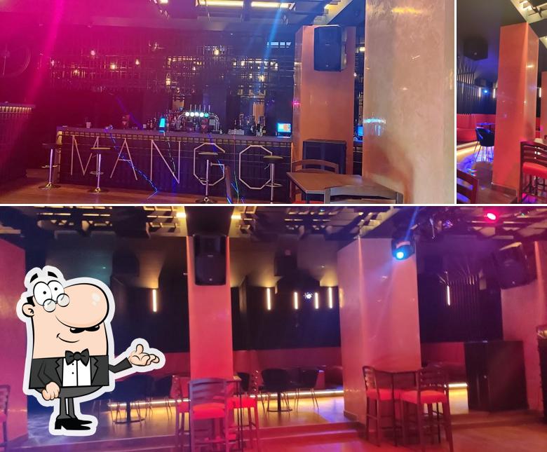 The photo of interior and bar counter at Mango Night Club