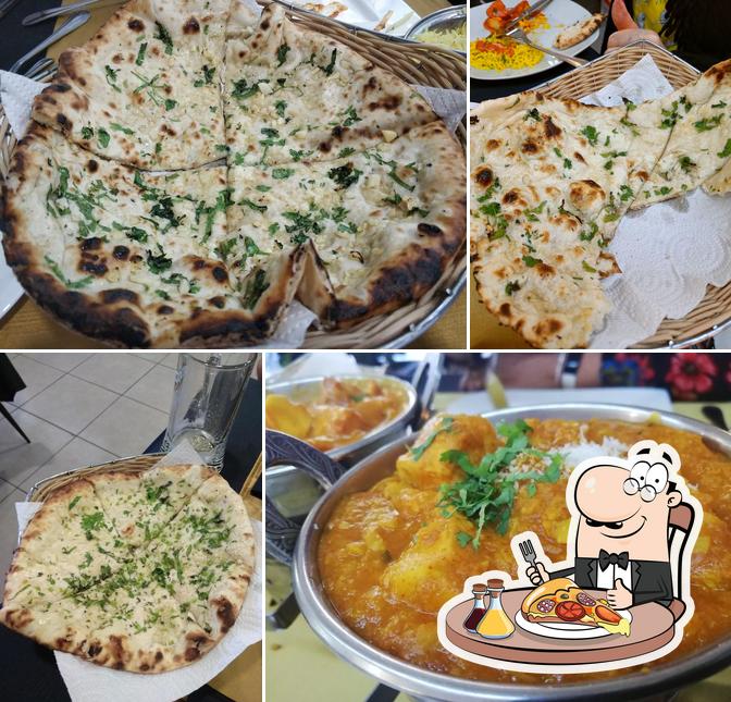 Get pizza at Delhi Darbar