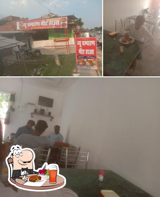 This is the photo displaying dining table and exterior at New Champaran Handi Meat House