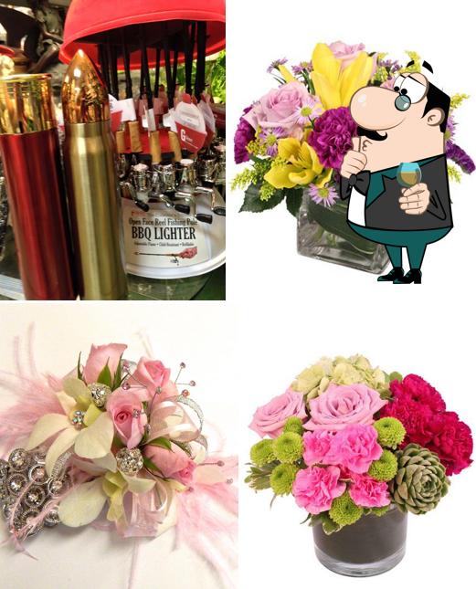 https://img.restaurantguru.com/c64c-Restaurant-Flower-Patch-Florist-Gifts-and-Sweet-Tooth-Bakery-bar-counter.jpg