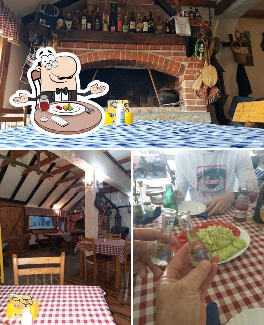 Las fotos de comedor y interior en Етно-Кућа "ОГЊИШТЕ"