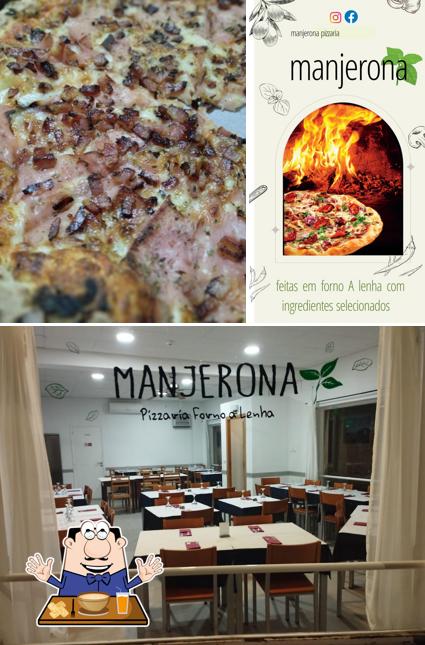 Entre diversos coisas, comida e interior podem ser encontrados a Manjerona Pizzaria Forno a Lenha