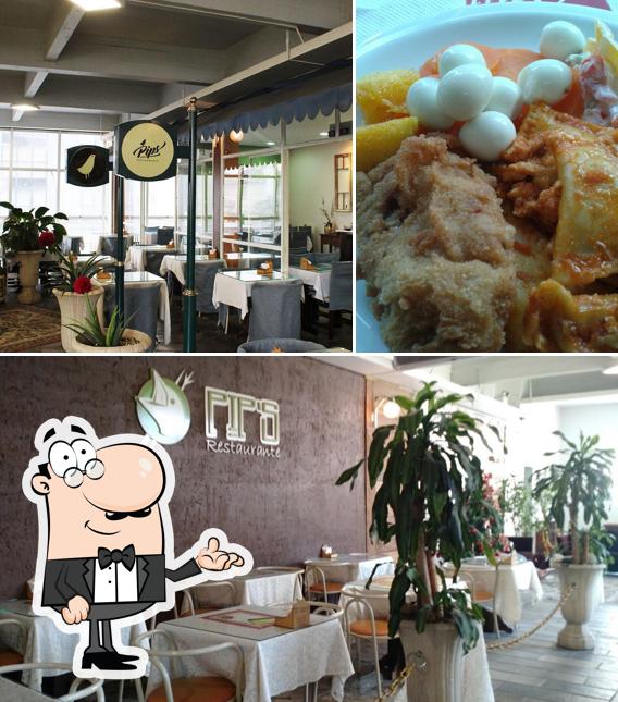 A imagem do Pips Restaurante’s interior e comida