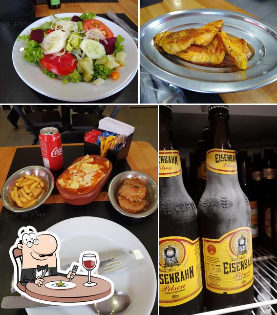 Check out the photo showing food and drink at Vila Bueno Restaurante