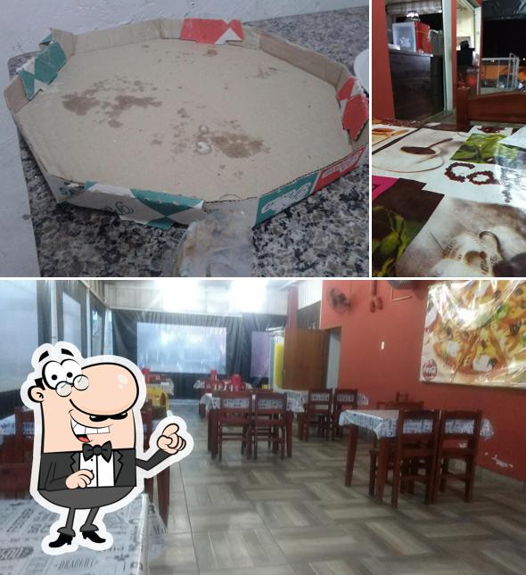 O interior do Pizzaria Kastelly