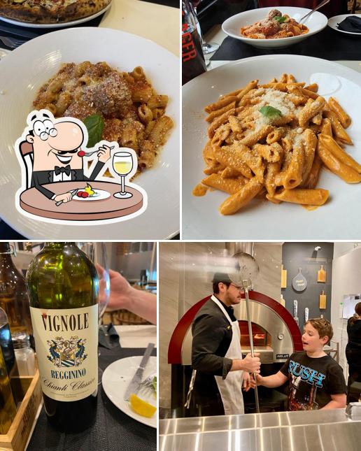 Voici la photo représentant la nourriture et comptoir de bar sur Famiglia Ristorante