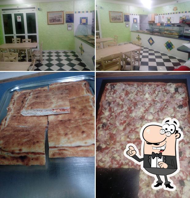 Guarda la immagine che mostra la interni e cibo di Pizzeria La Saporita