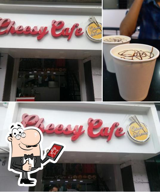 Look at the photo of Cheesy cafe