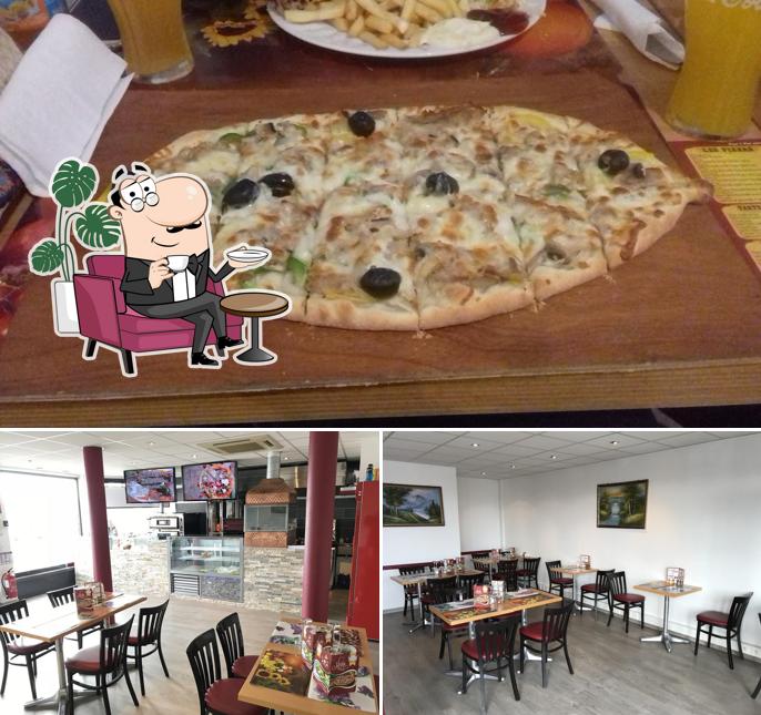 Voici la photo affichant la intérieur et pizza sur Hopla Flam