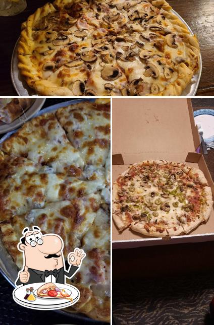 Try out pizza at Walt's Pizza & Restaurant