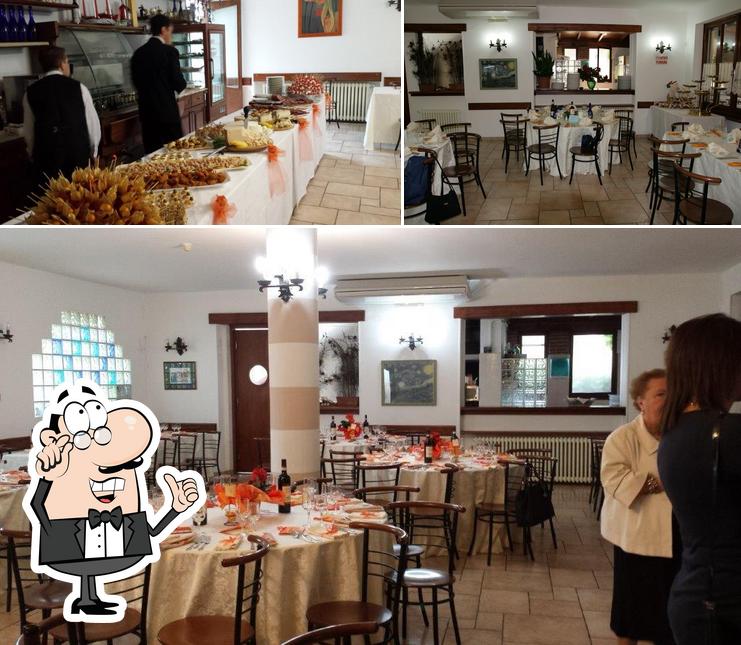 La foto della interni e cibo di Albergo Italia