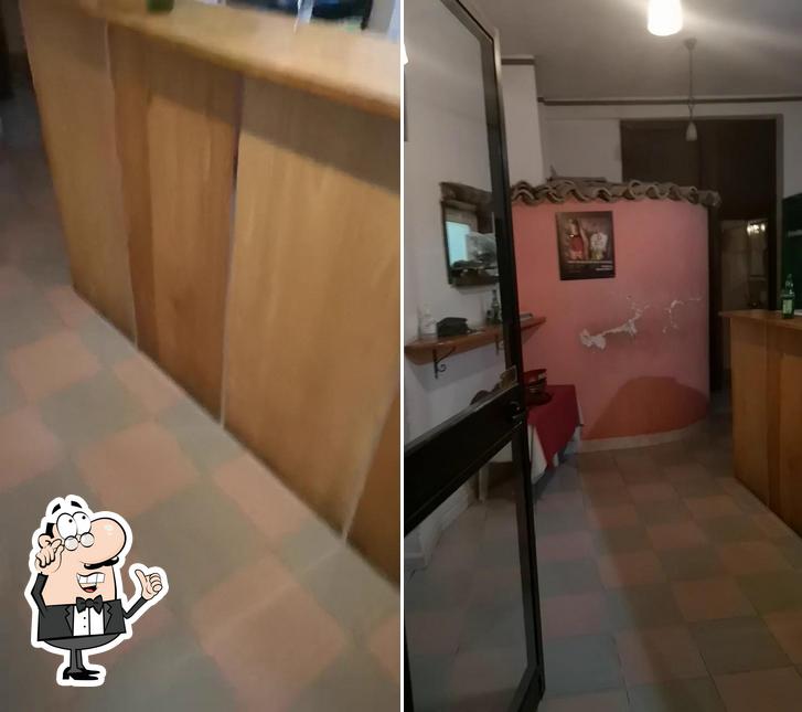 Dai un'occhiata agli interni di Il Vecchio Focolare Trattoria Pizzeria