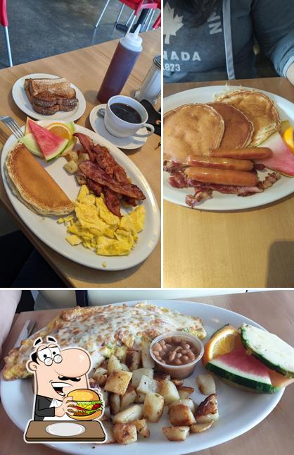 Prenez un hamburger à Resto L'industriel Café