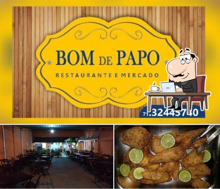 Dê uma olhada a foto mostrando interior e comida no Restaurante Bom de Papo