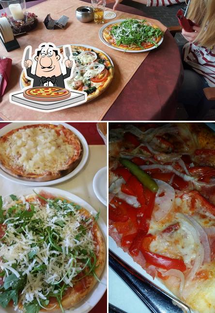 Prenez des pizzas à Pizzeria Mamma Maria