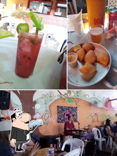 The photo of drink and interior at Casa da Sogra Bar e Restaurante