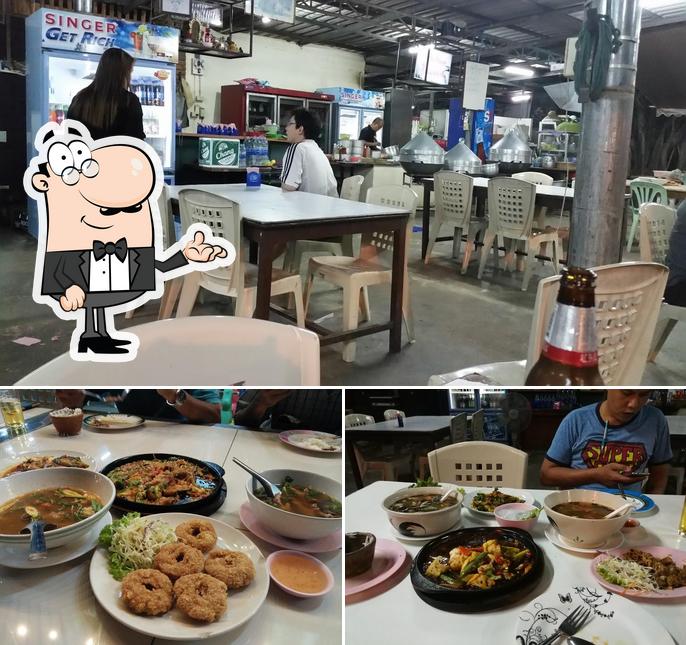 This is the photo displaying interior and food at Khao Hom Restaurant