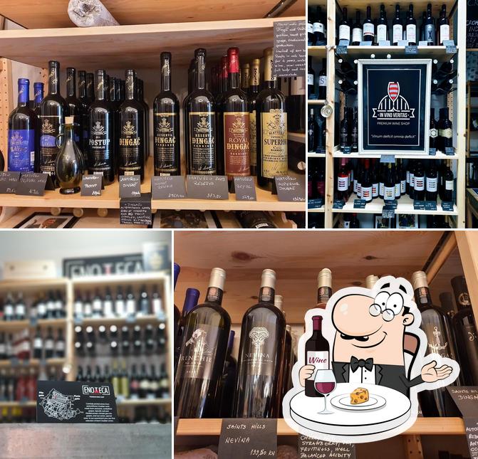 Ordina un bicchiere di vino a Enoteca wine shop