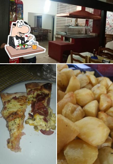 Entre diversos coisas, comida e interior podem ser encontrados a Restaurante Vitória