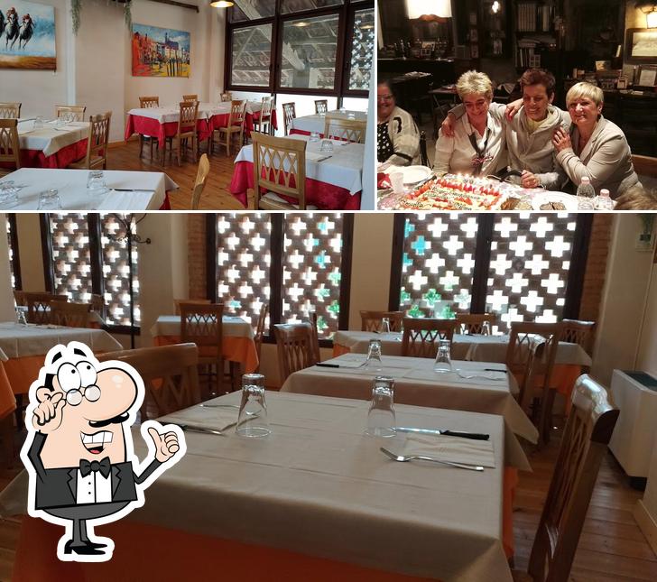 Siediti a un tavolo di Antica Trattoria Vittoria