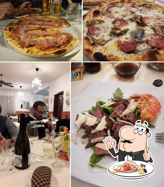 Essayez des pizzas à Pizzeria Trattoria La Rocca