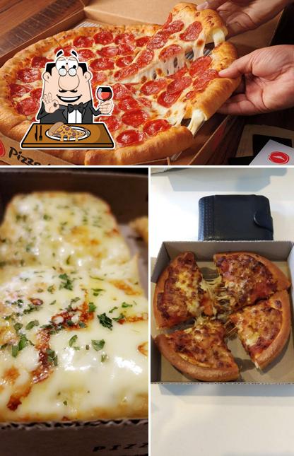 Попробуйте пиццу в "Pizza Hut Docklands"