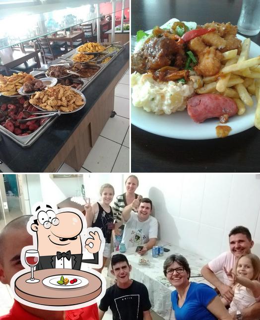 Entre diferentes coisas, comida e interior podem ser encontrados no Bar Restaurante E Churrascaria Capoeirão