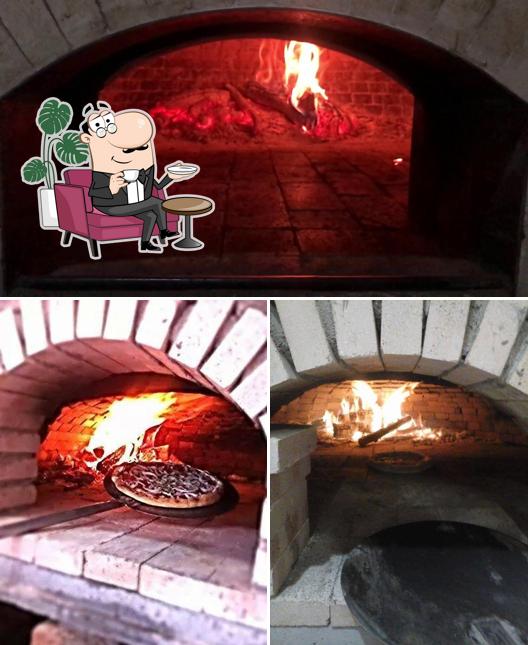 O interior do Pizzaria Milano