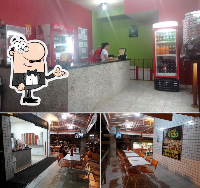 O interior do O Rei da Pizza