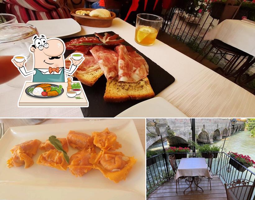 La foto della cibo e tavolo da pranzo di Caffè Visconti Restaurant & Bar