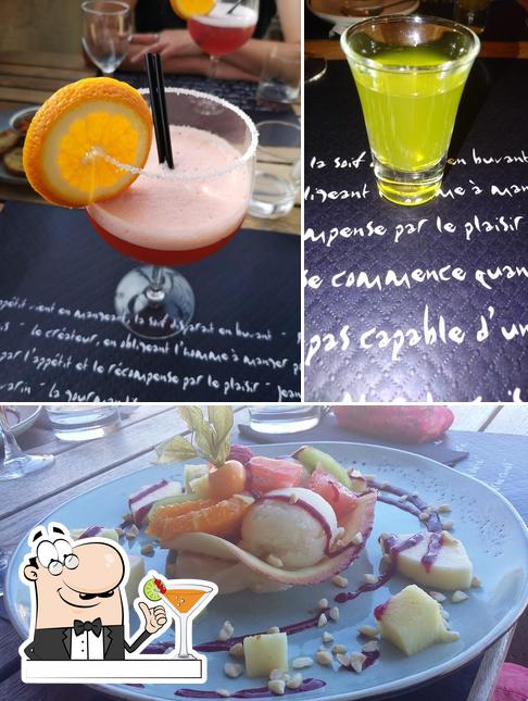 Take a look at the photo displaying drink and food at La Calade
