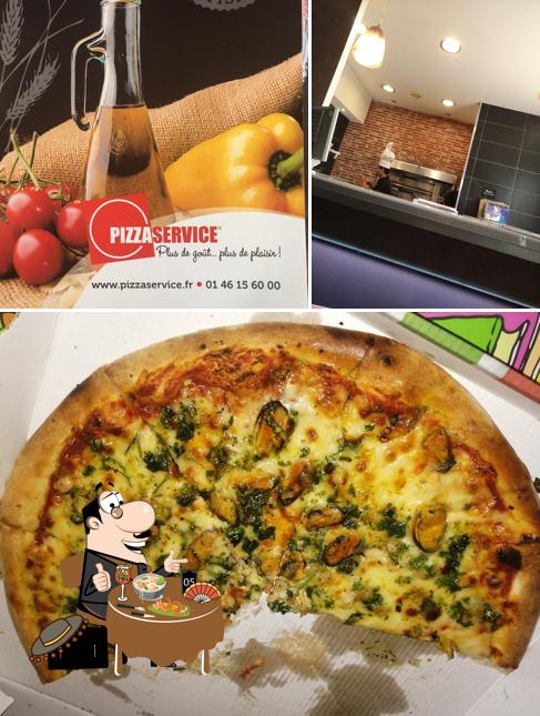 Jetez un coup d’oeil à la photo représentant la nourriture et intérieur concernant Pizza Service