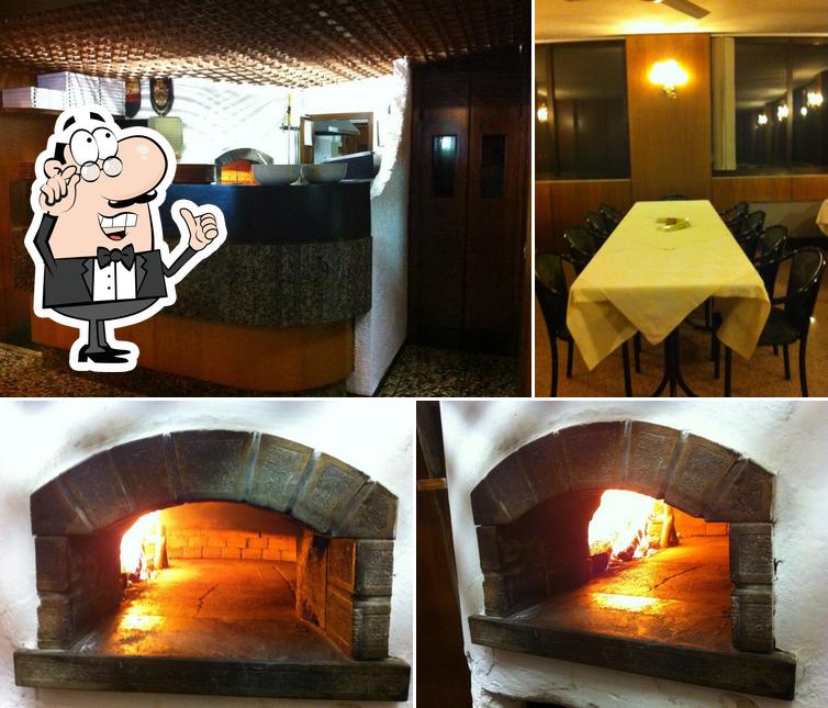 Dai un'occhiata agli interni di Pizzeria la Torre