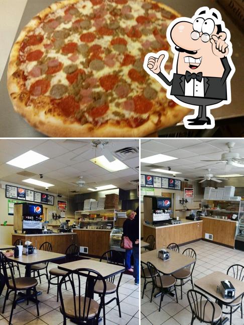 Внутреннее оформление и пицца - все это можно увидеть на этом изображении из Sami's Pizza