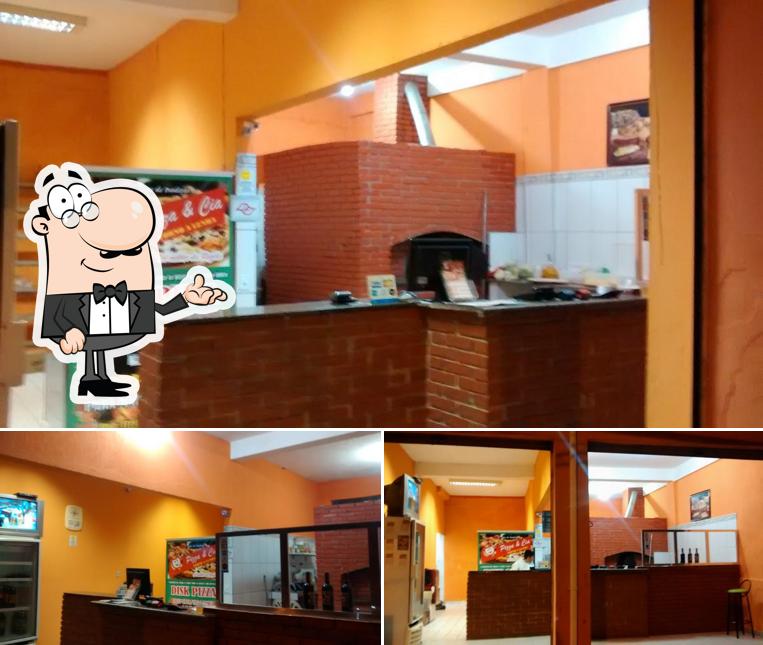 O interior do Pizza & Cia