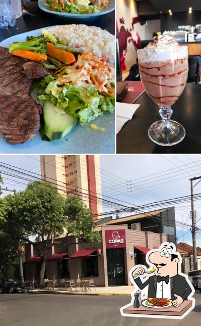 Entre diferentes coisas, comida e exterior podem ser encontrados no Cafeteria e Vinheteria no Centro - Copas Café & Vinho