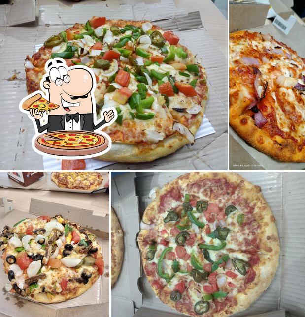 Try out pizza at Domino's Pizza