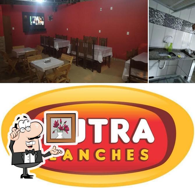 Confira a foto apresentando interior e comida no Dutra Lanches