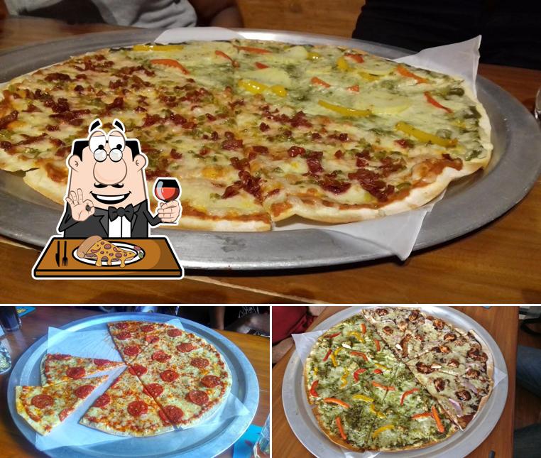 Try out pizza at Mighty Crust Pizzeria - Crafting Perfection, Serving the Best Pizza Nearby