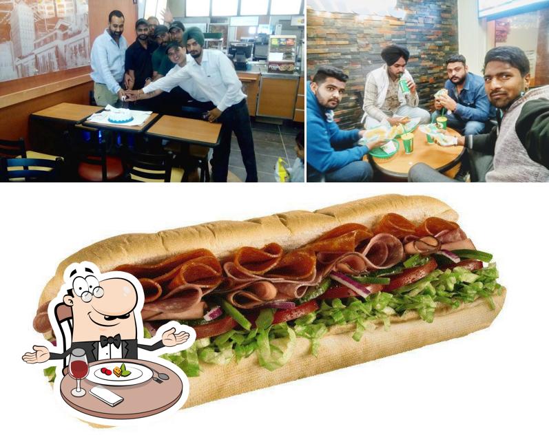 Subway is distinguished by dining table and food