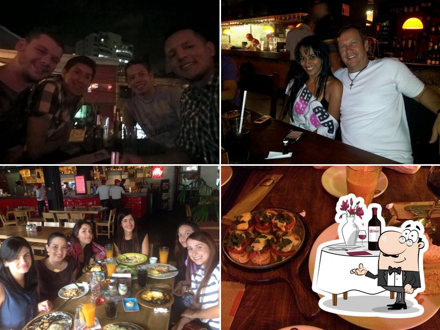 Las imágenes de comedor y barra de bar en il forno Parque Lleras Medellín