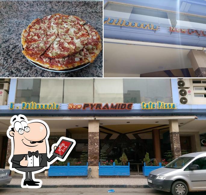 La extérieur et pizza du restaurant