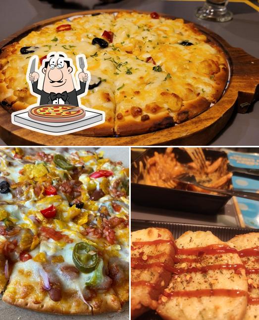 Get pizza at Crazy Cheesy Cafe- Salunkhe Vihar