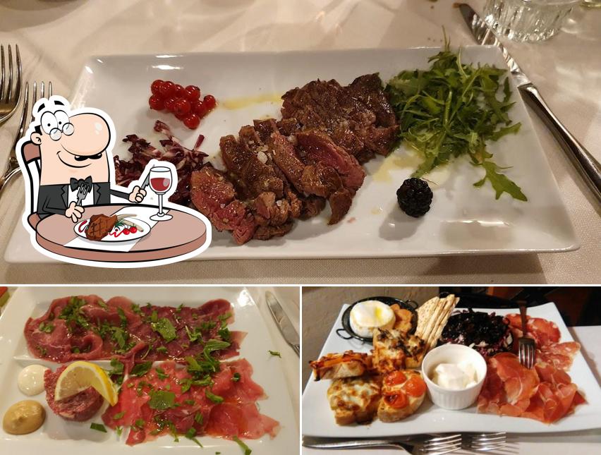 Попробуйте блюда из мяса в "Osteria delle Mura"