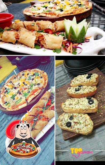 Get pizza at TCRC - The Club Road Cafe