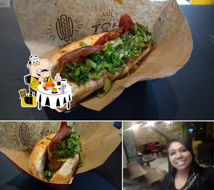 Esta é a foto apresentando comida e mesa de jantar no Dogueria Original Hot Dog