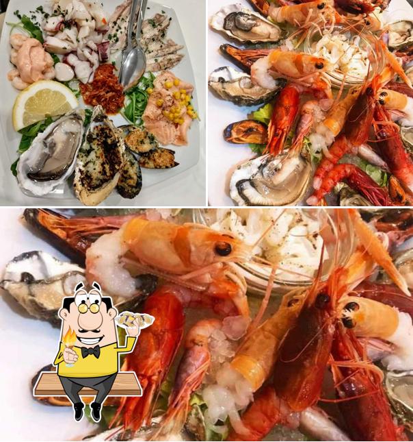 Prenditi tra i vari piatti di mare disponibili a Fuori Tempo Restaurant