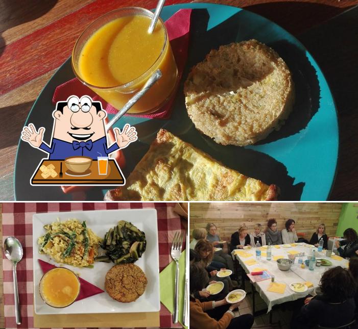 Questa è la foto che mostra la cibo e tavolo da pranzo di Bioteca Bistrobottega