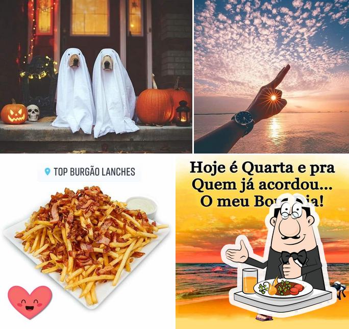 Entre diversos coisas, comida e exterior podem ser encontrados no Top Burgão Lanches