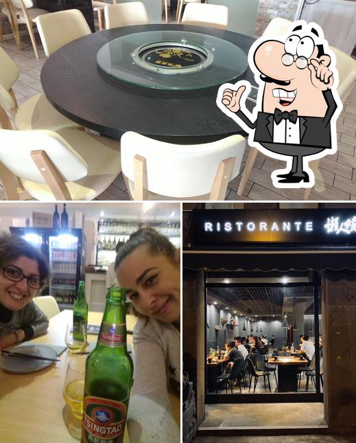 La immagine di interni e birra da Ristorante TongLuoWan